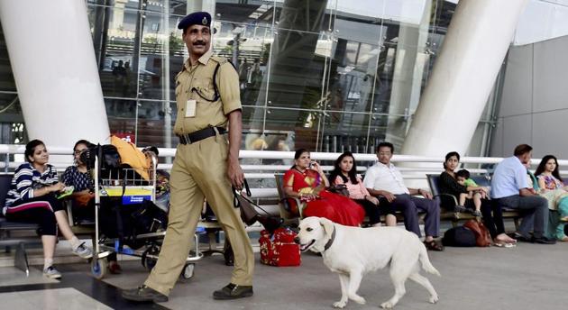 File photo of a CISF man with sniffer dog at the Chennai International Airport. Chennai is among the six airports where passengers will not need to have their hand baggage tags stamped from June 1. (PTI) File photo of a CISF man with sniffer dog at the Chennai International Airport. Chennai is among the six airports where passengers will not need to have their hand baggage tags stamped from June 1. (PTI)