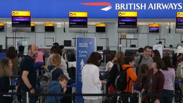 Passengers arrive with their luggage in Terminal 5 of London's Heathrow Airport on May 29, 2017. Passengers faced a third day of disruption at Heathrow Monday as British Airways cancelled short-haul flights after a global computer crash that unions blamed on the outsourcing of IT services to India. (AFP) Passengers arrive with their luggage in Terminal 5 of London's Heathrow Airport on May 29, 2017. Passengers faced a third day of disruption at Heathrow Monday as British Airways cancelled short-haul flights after a global computer crash that unions blamed on the outsourcing of IT services to India. (AFP)