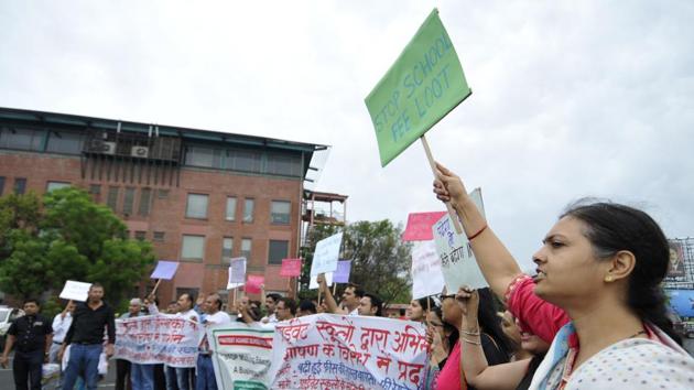Parents have been demanding a cap on fee hike by private schools for the past three months in Noida and other cities. (Sunil Ghosh/HT Photo) Parents have been demanding a cap on fee hike by private schools for the past three months in Noida and other cities. (Sunil Ghosh/HT Photo)