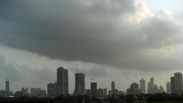 Dark clouds gather over the skyline in Mumbai on May 29 as monsoon season approaches. (AFP Photo) Dark clouds gather over the skyline in Mumbai on May 29 as monsoon season approaches. (AFP Photo)