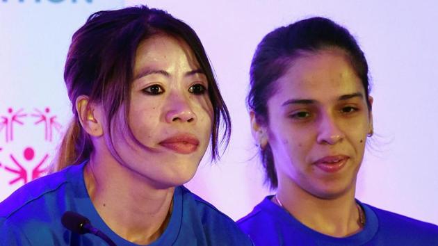 Boxer Mary Kom, flanked here by Saina Nehwal (R), will return to action after a one year break.(PTI)