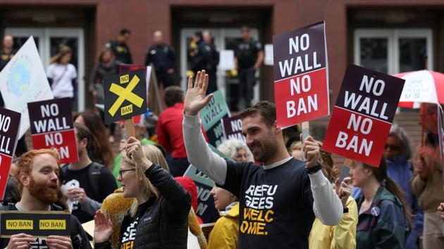 People protest US President Donald Trump's travel ban outside of the US Court of Appeals in Seattle, Washington on May 15. (REUTERS FILE) People protest US President Donald Trump's travel ban outside of the US Court of Appeals in Seattle, Washington on May 15. (REUTERS FILE)