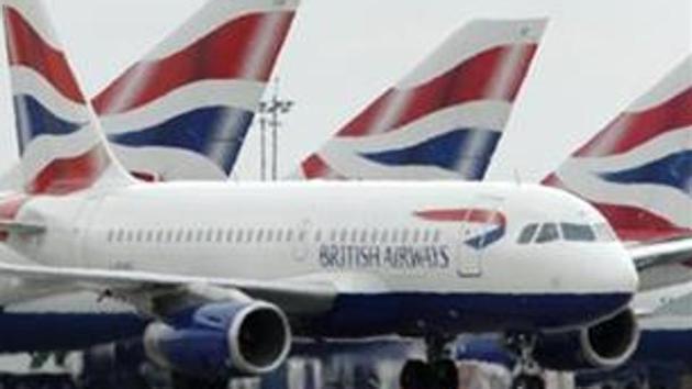 British Airways passenger jet taxis past parked BA jets at Heathrow airport in London. (Reuters photo) British Airways passenger jet taxis past parked BA jets at Heathrow airport in London. (Reuters photo)