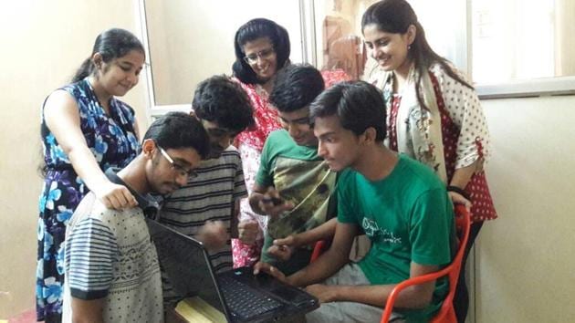 Students check their results in Mumbai on Tuesday. (Praful Gangurde) Students check their results in Mumbai on Tuesday. (Praful Gangurde)