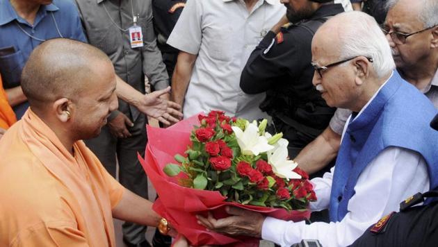 Senior BJP leader LK Advani being greeted by Uttar Pradesh Chief Minister Yogi Adityanath at the VIP Guest House in Lucknow on Tuesday. Advani appeared before a special Central Bureau of Investigation (CBI) court in connection with the Babri Masjid demolition case. (PTI Photo) Senior BJP leader LK Advani being greeted by Uttar Pradesh Chief Minister Yogi Adityanath at the VIP Guest House in Lucknow on Tuesday. Advani appeared before a special Central Bureau of Investigation (CBI) court in connection with the Babri Masjid demolition case. (PTI Photo)