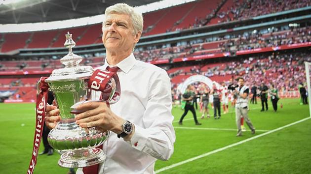 Arsene Wenger, manager of Arsenal FC, celebrates with the FA Cup after beating Chelsea FC in the final at Wembley Stadium on Saturday. (Getty Images) Arsene Wenger, manager of Arsenal FC, celebrates with the FA Cup after beating Chelsea FC in the final at Wembley Stadium on Saturday. (Getty Images)