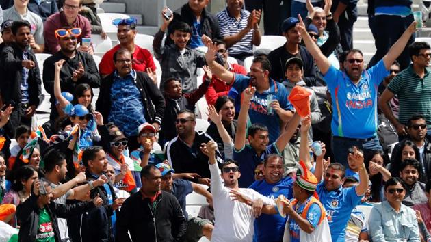 The Indian contingent had fun during the India innings. (AFP) The Indian contingent had fun during the India innings. (AFP)