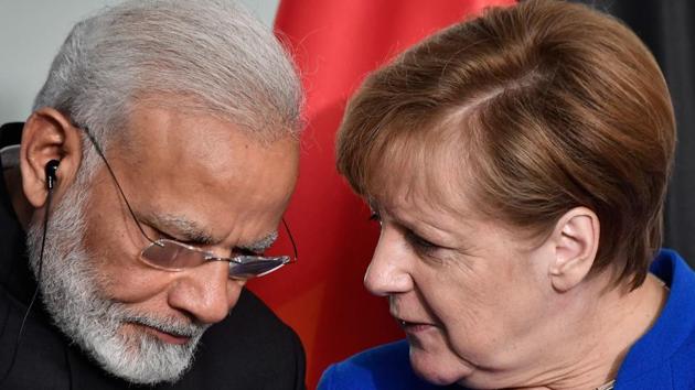German Chancellor Angela Merkel and Indian Prime Minister Narendra Modi speak after a press conference following talks and the signing of agreements at the Chancellery in Berlin, on May 30. (AFP Photo) German Chancellor Angela Merkel and Indian Prime Minister Narendra Modi speak after a press conference following talks and the signing of agreements at the Chancellery in Berlin, on May 30. (AFP Photo)