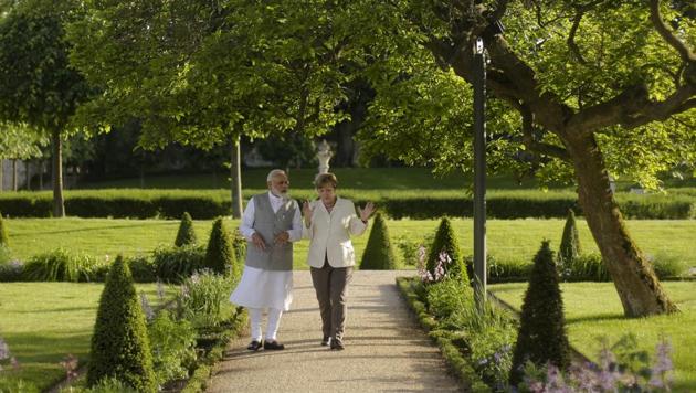 German Chancellor Angela Merkel, right, and Prime Minister Narendra Modi, walk through the garden of the government guest house Meseberg Palace during a meeting in Meseberg. (AP Photo) German Chancellor Angela Merkel, right, and Prime Minister Narendra Modi, walk through the garden of the government guest house Meseberg Palace during a meeting in Meseberg. (AP Photo)