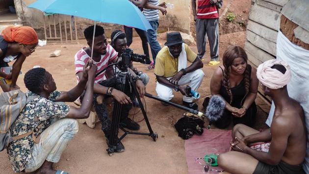 Actors and the technical camera team film a scene during the making of a Kumawood movie. These are generally low-budget movies which take about a week’s time to finish recording. (Cristina Aldehuela/AFP) Actors and the technical camera team film a scene during the making of a Kumawood movie. These are generally low-budget movies which take about a week’s time to finish recording. (Cristina Aldehuela/AFP)