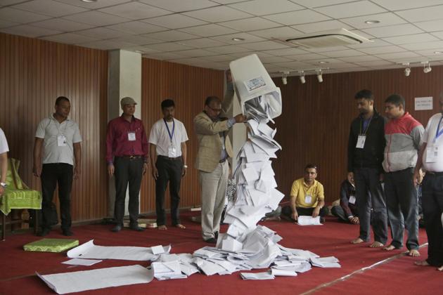 File photo of a Nepalese election commission officer emptying a ballot box prior to counting the votes in after the first phase of local elections in Kathmandu. (AP) File photo of a Nepalese election commission officer emptying a ballot box prior to counting the votes in after the first phase of local elections in Kathmandu. (AP)