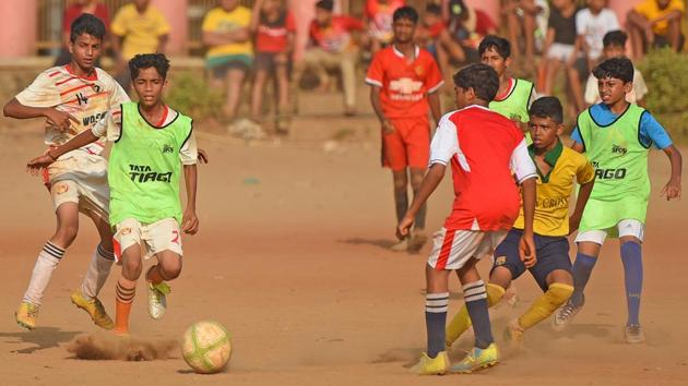 Heat, dust, humidity, nothing can stop these children from playing football during their summer break at Shivaji park in Dadar. (Pratik Chorge/HT Photo)