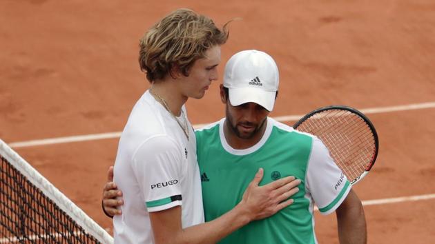 Spain's Fernando Verdasco (R) hugs Germany's Alexander Zverev after winning their match at the French Open. (AFP) Spain's Fernando Verdasco (R) hugs Germany's Alexander Zverev after winning their match at the French Open. (AFP)