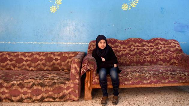 An Egyptian girl sits on a sofa at the Banati Foundation shelter, a civil society organisation that works with street children, in the capital Cairo. For Egypt's government and civil society groups, tackling the growing problem of street children, some from second- and even third-generation homeless families, is proving difficult. According to the most recent ministry figures from a 2014 survey, Egypt has about 16,000 street children, said the spokesman for the "Children Without Shelter" programme. (Mohamed el-Shahed/AFP) An Egyptian girl sits on a sofa at the Banati Foundation shelter, a civil society organisation that works with street children, in the capital Cairo. For Egypt's government and civil society groups, tackling the growing problem of street children, some from second- and even third-generation homeless families, is proving difficult. According to the most recent ministry figures from a 2014 survey, Egypt has about 16,000 street children, said the spokesman for the "Children Without Shelter" programme. (Mohamed el-Shahed/AFP)