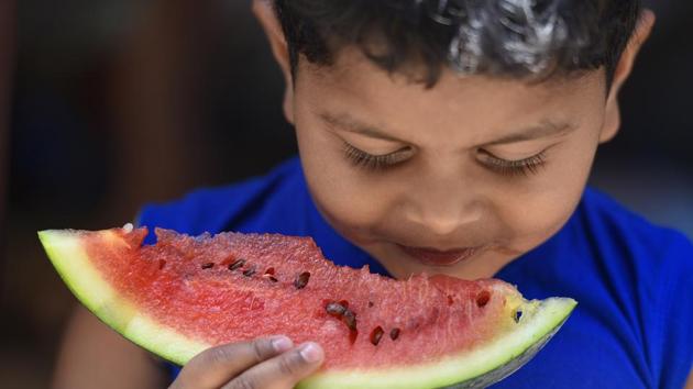 A juicy bite of a slice of watermelon can help in lowering blood pressure, lowering inflammation and reducing kidney disorders. (Raj K Raj/HT PHOTO) 