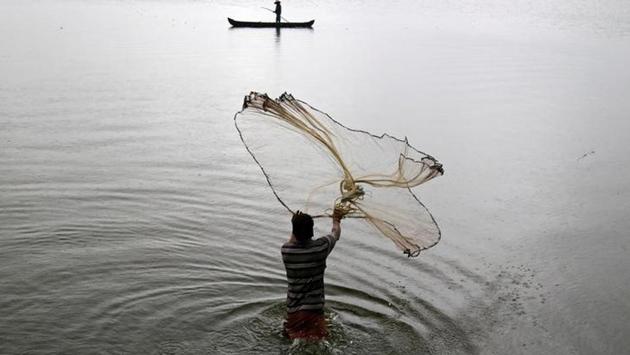 A fisherman casts his fishing net into the waters on a rainy day on the outskirts of Kochi.The regional centre in Thiruvananthapuram put out a weather warning for fishermen and people staying in coastal areas for heavy rains in the next 48 hours. (Sivaram V/Reuters) A fisherman casts his fishing net into the waters on a rainy day on the outskirts of Kochi.The regional centre in Thiruvananthapuram put out a weather warning for fishermen and people staying in coastal areas for heavy rains in the next 48 hours. (Sivaram V/Reuters)