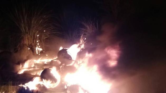 The occupants of the PCR van were rescued in the nick of time from the burning car by locals and police officials. (HT Photo) The occupants of the PCR van were rescued in the nick of time from the burning car by locals and police officials. (HT Photo)