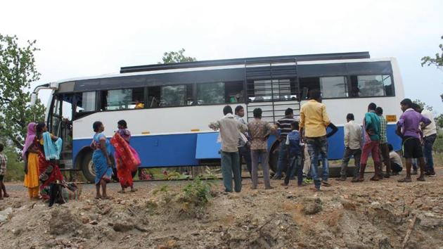 Although scared, the bus driver and commuters take comfort in the fact that the Maoists till date have not targeted a civilian passenger bus.(HT Photo)
