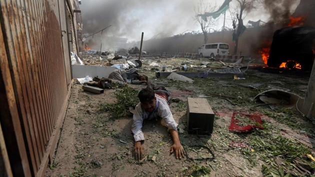 At least 80 people were killed and more than 350 wounded when a massive bomb tore through Kabul’s strongly fortified diplomatic quarter during the Wednesday morning rush hour, Afghan officials said. (Omar Sobhan/ REUTERS)