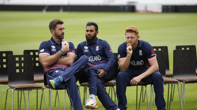 Liam Plunkett, Adil Rashid and Jonny Bairstow discuss strategy. (REUTERS)