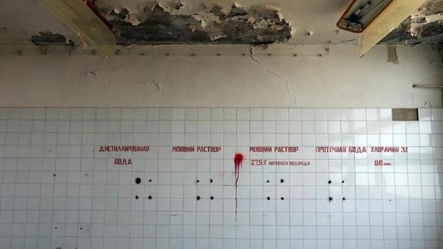 Russian writing is seen on a wall in a surgery department of a former Soviet military hospital. The place now is eerily quiet, with pigeons flying across occasionally. (Laszlo Balogh/REUTERS) Russian writing is seen on a wall in a surgery department of a former Soviet military hospital. The place now is eerily quiet, with pigeons flying across occasionally. (Laszlo Balogh/REUTERS)