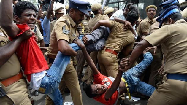 Police remove members of RSYF in Chennai, protesting against Prime Minister Narendra Modi and the Centre’s ban on the sale of cows for slaughter through animal markets.(AFP)