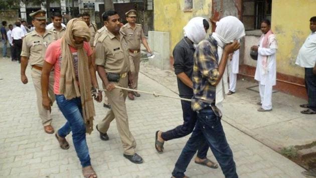 Three suspects in the Rampur molestation case being taken to the district court on Monday. (AFP photo) Three suspects in the Rampur molestation case being taken to the district court on Monday. (AFP photo)