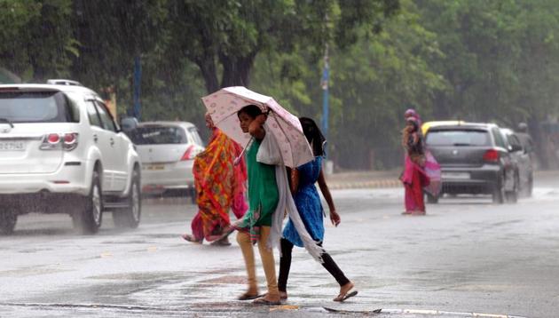 Residents got some relief from the heat that has been dogging them for most of last month. The sky remained overcast throughout the day on Wednesday and lightning was reported from some parts. (Parveen Kumar/HT Photo) Residents got some relief from the heat that has been dogging them for most of last month. The sky remained overcast throughout the day on Wednesday and lightning was reported from some parts. (Parveen Kumar/HT Photo)