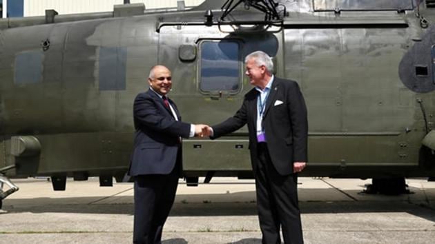 Pakistan’s high commissioner to the UK, Syed Ibne Abbas (left), with Christopher Bob Richardson from Britain’s defence ministry during the ceremony for the handing over of seven Sea King helicopters for the Pakistan Navy. (Courtesy phclondon.org) Pakistan’s high commissioner to the UK, Syed Ibne Abbas (left), with Christopher Bob Richardson from Britain’s defence ministry during the ceremony for the handing over of seven Sea King helicopters for the Pakistan Navy. (Courtesy phclondon.org)