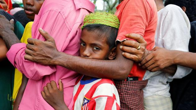 A Rohingya refugee boy stands in a queue to collect relief supplies. Following the recent influx,the Bangladeshi government has estimated that there are about 350,000 Rohingyas in the country. (Mohammad Ponir Hossain/REUTERS) A Rohingya refugee boy stands in a queue to collect relief supplies. Following the recent influx,the Bangladeshi government has estimated that there are about 350,000 Rohingyas in the country. (Mohammad Ponir Hossain/REUTERS)