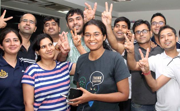 Karnataka's Nandini K R (centre), who stood first in the civil services exams 2016, celebrates with her colleagues in Faridabad on Wednesday. (PTI) Karnataka's Nandini K R (centre), who stood first in the civil services exams 2016, celebrates with her colleagues in Faridabad on Wednesday. (PTI)