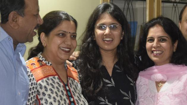 Navya Singla with her family at their Sector-8 residence in Panchkula on Wednesday. (Sant Arora/HT) Navya Singla with her family at their Sector-8 residence in Panchkula on Wednesday. (Sant Arora/HT)