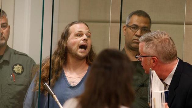 Jeremy Christian, accused of fatally stabbing two Good Samaritans who tried to stop Christian from harassing a pair of women who appeared to be Muslim, shouts during an appearance in Multnomah County Circuit Court in Portland, Oregon, US, May 30, 2017
