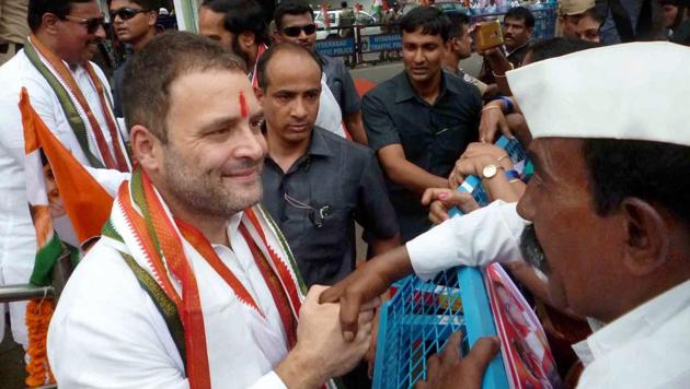 Congress vice-president Rahul Gandhi greets a supporter during the Telangana Praja Garjana roadshow at Sangareddi town on Thursday. (PTI) Congress vice-president Rahul Gandhi greets a supporter during the Telangana Praja Garjana roadshow at Sangareddi town on Thursday. (PTI)
