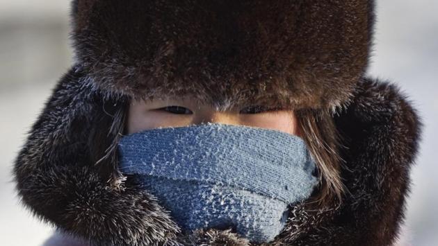 A girl poses for a picture in Oymyakon, a village which is 750 metres above sea level. (Maxim Shemetov / REUTERS) A girl poses for a picture in Oymyakon, a village which is 750 metres above sea level. (Maxim Shemetov / REUTERS)