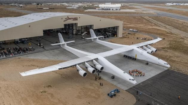 The Stratolaunch plane is pushed out of the hanger for the first time in the Mojave desert, California on May 31, 2017.(AFP Photo)