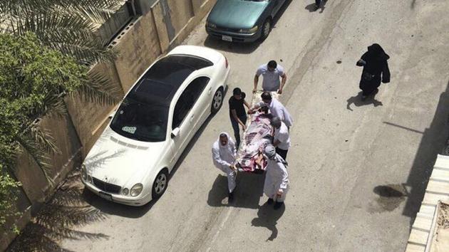 This image provided by an activist who requested to remain unnamed, shows people carrying a man who was injured in a raid on an sit-in, in Diraz, Bahrain, Tuesday, May 23, 2017. Bahrain police raided a town where the sit-in has been going on for months in support of Sheikh Isa Qassim, a prominent Shia cleric, who had his citizenship stripped by the government. (AP Photo) This image provided by an activist who requested to remain unnamed, shows people carrying a man who was injured in a raid on an sit-in, in Diraz, Bahrain, Tuesday, May 23, 2017. Bahrain police raided a town where the sit-in has been going on for months in support of Sheikh Isa Qassim, a prominent Shia cleric, who had his citizenship stripped by the government. (AP Photo)