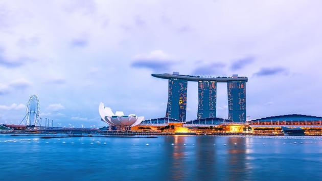 Evening landscape with Museum of Fine Arts and Marina Bay Sands Hotel, Singapore. (Shutterstock) Evening landscape with Museum of Fine Arts and Marina Bay Sands Hotel, Singapore. (Shutterstock)