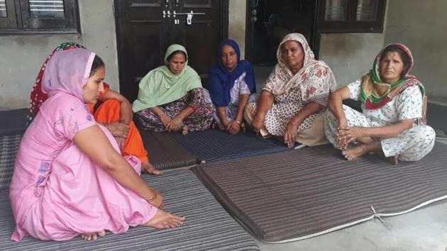 Relatives gathered at Manpreet’s home in Khai village of Sangrur district on Friday.(HT Photo)