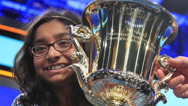 Ananya Vinay, 12, from Fresno, California, holds the trophy after being declared the winner of the 90th Scripps National Spelling Bee, in Oxon Hill.(AP Photo)