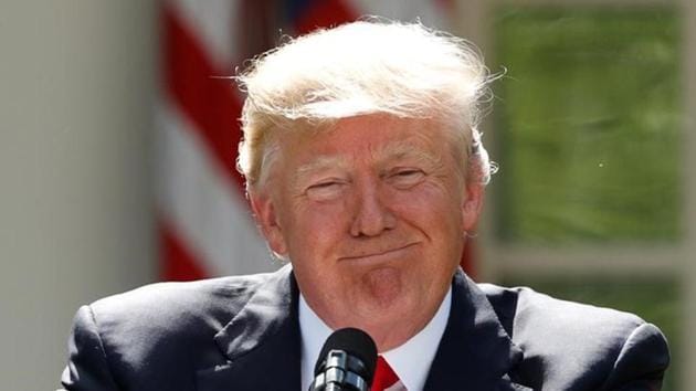 US President Donald Trump pauses as he announces his decision that the United States will withdraw from the landmark Paris Climate Agreement, in the Rose Garden of the White House in Washington. (Reuters) US President Donald Trump pauses as he announces his decision that the United States will withdraw from the landmark Paris Climate Agreement, in the Rose Garden of the White House in Washington. (Reuters)
