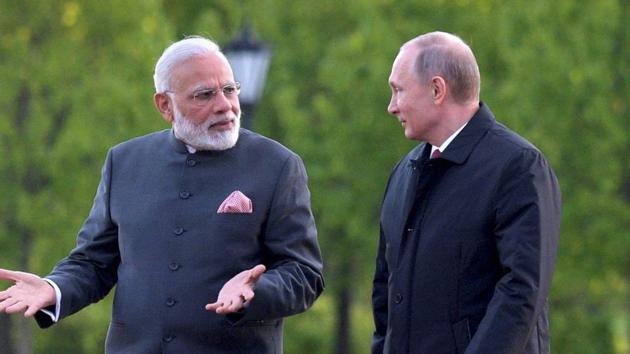 Prime Minister Narendra Modi and Russian President Vladimir Putin talk to each other as they walk near the Constantine (Konstantinovsky) Palace at the St. Petersburg International Economic Forum in St. Petersburg, Russia. (AP Photo) Prime Minister Narendra Modi and Russian President Vladimir Putin talk to each other as they walk near the Constantine (Konstantinovsky) Palace at the St. Petersburg International Economic Forum in St. Petersburg, Russia. (AP Photo)