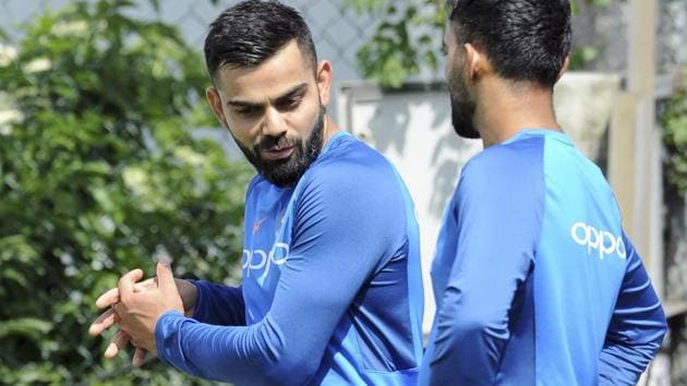 Indian cricket team captain Virat Kohli shows a batting technique ahead of their ICC Champions Trophy opener.(AP)