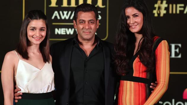 Bollywood actors Salman Khan (C), Katrina Kaif (R) and Alia Bhatt (L) pose during a press conference.(AFP)