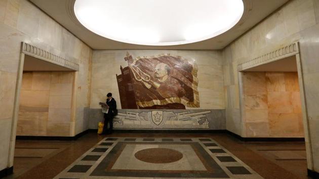 A man reads a newspaper at Baumanskaya metro station in Moscow. One of the busiest and most visually stunning underground systems in the world,it is a tourist site in its own right.When it opened in 1935, the metro had just 11 stations and attracted 285,000 curious riders on the first day. Today there are 206 stations and up to nine million passengers a day. The metro has been expanding fast in the last few years, and modernising with one eye on the World Cup that Russia will host in 2018. (REUTERS) A man reads a newspaper at Baumanskaya metro station in Moscow. One of the busiest and most visually stunning underground systems in the world,it is a tourist site in its own right.When it opened in 1935, the metro had just 11 stations and attracted 285,000 curious riders on the first day. Today there are 206 stations and up to nine million passengers a day. The metro has been expanding fast in the last few years, and modernising with one eye on the World Cup that Russia will host in 2018. (REUTERS)