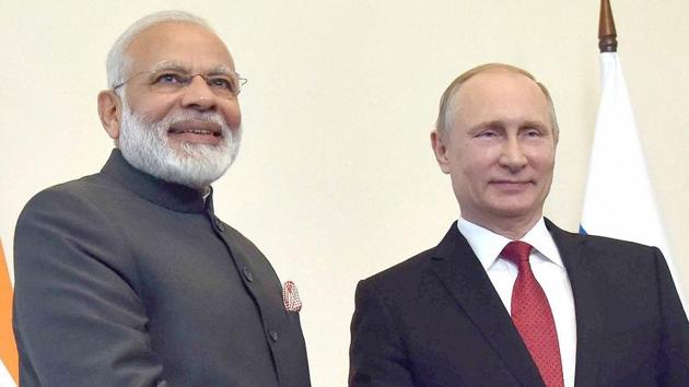 Prime Minister Narendra Modi shakes hands with Russian President Vladimir Putin, at the 18th India Russia Annual Summit, at Konstantin Palace, in St. Petersburg, Russia on Thursday. (PTI) Prime Minister Narendra Modi shakes hands with Russian President Vladimir Putin, at the 18th India Russia Annual Summit, at Konstantin Palace, in St. Petersburg, Russia on Thursday. (PTI)