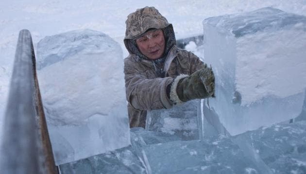 Ruslan, 35, loads blocks of ice onto a truck outside Yakutsk in the Republic of Sakha, northeast Russia. Known as the ‘Pole of Cold’, the coldest temperatures in the northern hemisphere is considered to be the coldest permanently inhabited settlement in the world. (Maxim Shemetov / REUTERS) Ruslan, 35, loads blocks of ice onto a truck outside Yakutsk in the Republic of Sakha, northeast Russia. Known as the ‘Pole of Cold’, the coldest temperatures in the northern hemisphere is considered to be the coldest permanently inhabited settlement in the world. (Maxim Shemetov / REUTERS)
