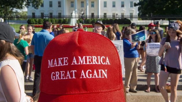 A variety of protestors come together attending a demonstration in front of the White House in Washington, DC on June 1, 2017, objecting to US President Donald Trump's decision to withdraw from the Paris Climate accord. (AFP) A variety of protestors come together attending a demonstration in front of the White House in Washington, DC on June 1, 2017, objecting to US President Donald Trump's decision to withdraw from the Paris Climate accord. (AFP)