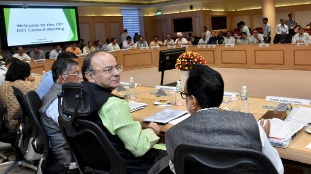 Union finance minister Arun Jaitley with MoS Santosh Gangwar and revenue secretary Hasmukh Adhia at the 15th Goods and Services Tax (GST) meeting in New Delhi. (PTI Photo) Union finance minister Arun Jaitley with MoS Santosh Gangwar and revenue secretary Hasmukh Adhia at the 15th Goods and Services Tax (GST) meeting in New Delhi. (PTI Photo)