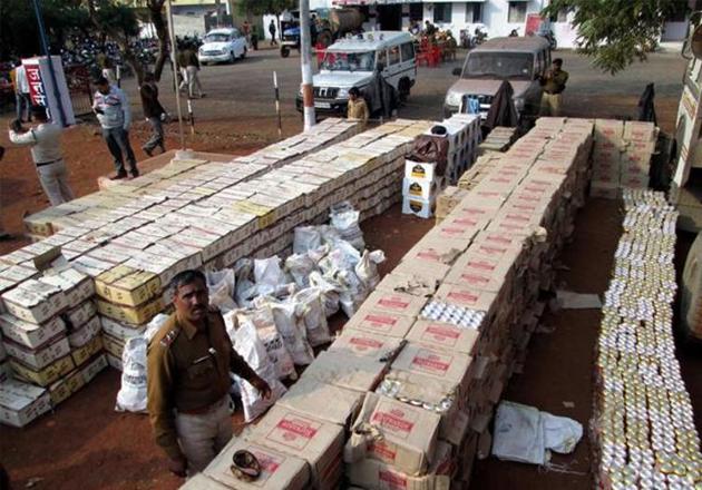 The liquor consignment was being unloaded from a truck when a police party raided the school premises. (HT representative pic) The liquor consignment was being unloaded from a truck when a police party raided the school premises. (HT representative pic)